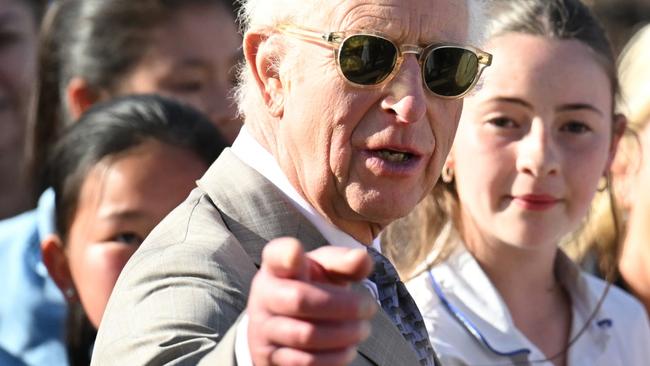 SYDNEY, AUSTRALIA - OCTOBER 22: Britain's King Charles III gestures during a visit to the Sydney Opera House on October 22, 2024 in Sydney, Australia. The King's visit to Australia is his first as monarch, and the Commonwealth Heads of Government Meeting (CHOGM) in Samoa will be his first as head of the Commonwealth. (Photo by Roni Bintang/Getty Images)