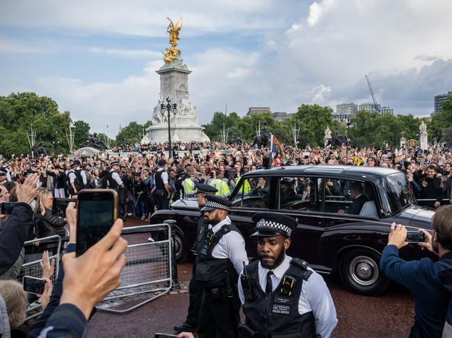 A car carrying King Charles III and Camilla, Queen Consort, leaves Buckingham Palace as crowds of mourners gather to pay their respects. Picture: Carl Court/Getty Images