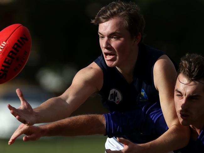 Dallyce Taylor of Epping competes with Sam Williams of Reservoir during the NFL match between Reservoir and Epping at Gloucester Road Oval in Reservoir on Saturday 24th June, 2017. Picture: Mark Dadswell