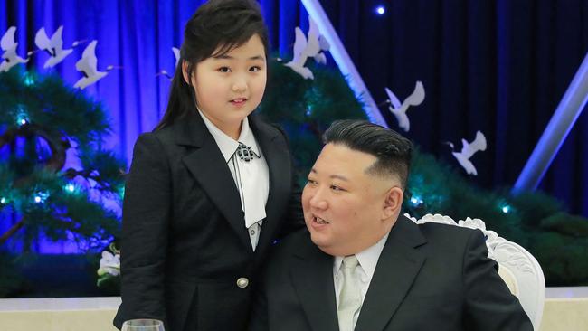 TOPSHOT - This picture taken on  February 7, 2023 and released from North Korea's official Korean Central News Agency (KCNA) on Fenruary 8, 2023 shows North Korean leader Kim Jong Un attending a banquet with his daughter is presumed to be Ju Ae  to mark the 75th anniversary of the Korean People's Army (KPA), in North Korea. (Photo by KCNA VIA KNS / AFP) / South Korea OUT / ---EDITORS NOTE--- RESTRICTED TO EDITORIAL USE - MANDATORY CREDIT "AFP PHOTO/KCNA VIA KNS" - NO MARKETING NO ADVERTISING CAMPAIGNS - DISTRIBUTED AS A SERVICE TO CLIENTS / THIS PICTURE WAS MADE AVAILABLE BY A THIRD PARTY. AFP CAN NOT INDEPENDENTLY VERIFY THE AUTHENTICITY, LOCATION, DATE AND CONTENT OF THIS IMAGE --- /