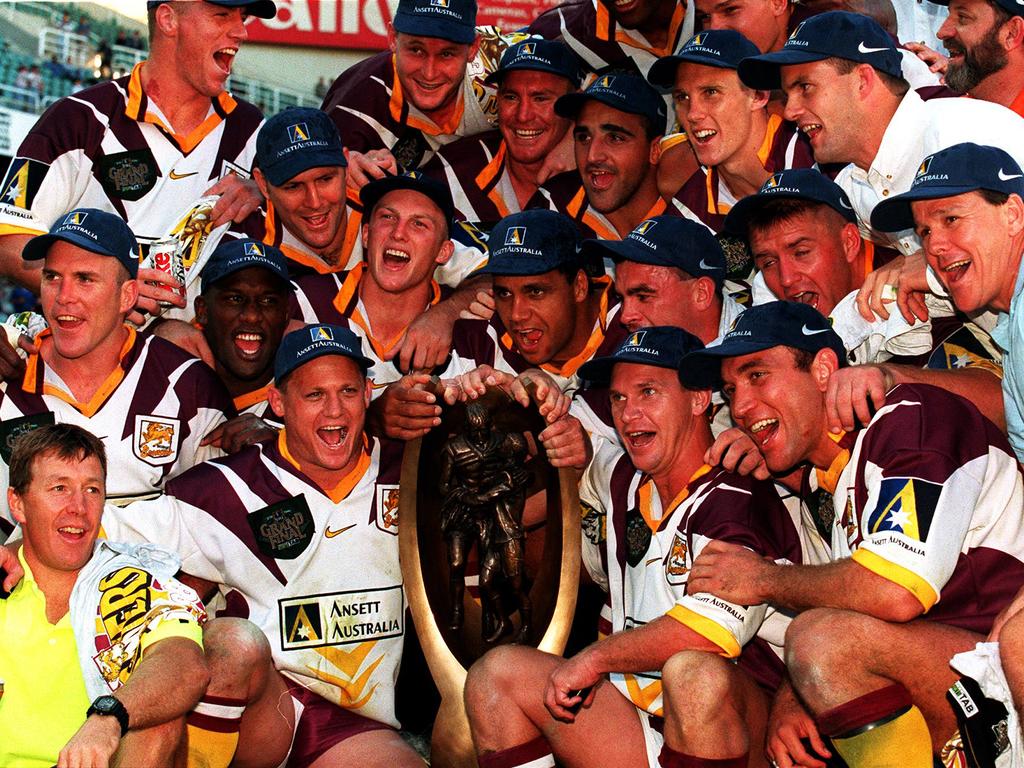 Walters, Lockyer and Webcke join the celebrations after Brisbane’s 1998 grand final victory.