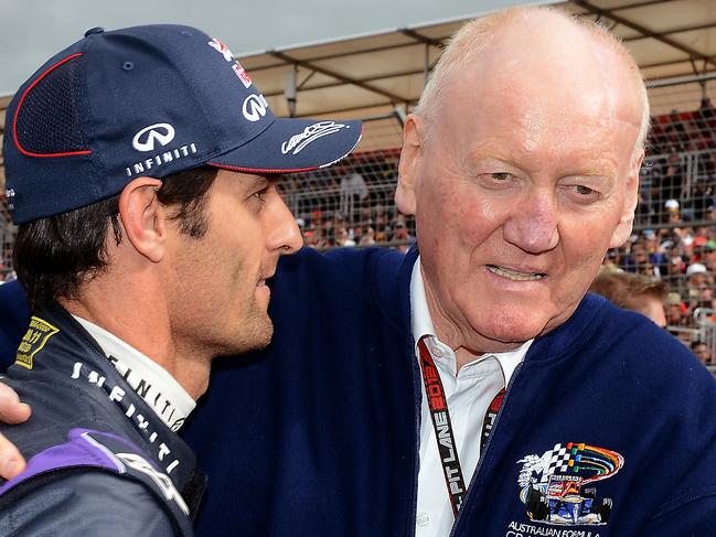 Grand Prix,Sunday,Melbourne, Mark Webber and Ron Walker hug on the starting grid before the race,