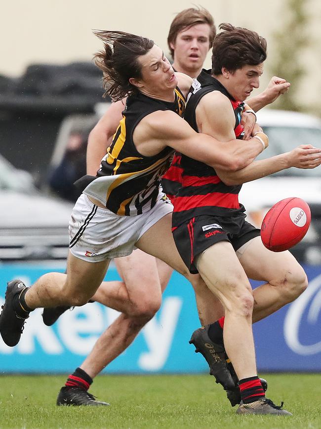 Benjamin Donnelly tackles Joshua Williams (Lauderdale) in the TSL clash between Lauderdale V Tigers Picture: NIKKI DAVIS-JONES