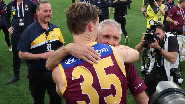 Ryan Lester and Chris Fagan celebrate winning the AFL Grand Final after defeating the Sydney Swans at the MCG. Picture Lachie Millard