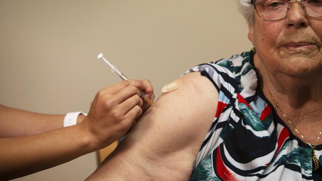 An aged care resident gets their vaccine as Healthy North Coast announces that all residents on the North Coast have had their COVID-19 shots.