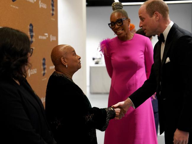 William shakes hands with Doreen Lawrence at the Science Museum in London. Picture: AFP