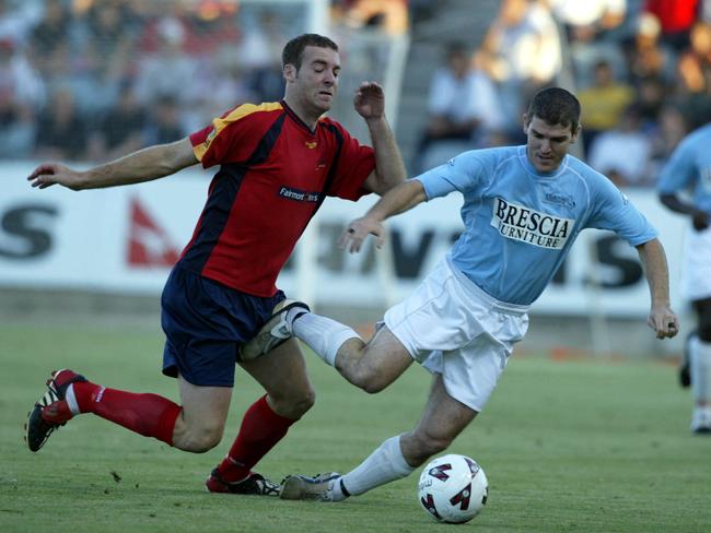 A 2004 photo of Rees (left) playing for Adelaide United against Sydney Marconi in the NSL. Picture: Ray Titus. Soccer