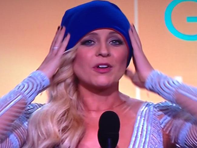 Calling for supporters ... Carrie Bickmore put on a beanie to help raise awareness of brain cancer. P{icture: Supplied