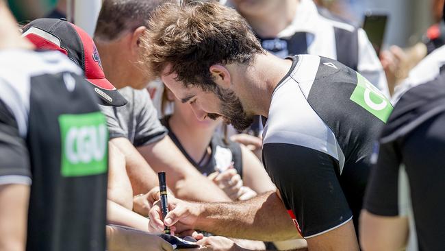 Steele Sidebottom signs autographs for fans in Southport on Wednesday. Picture: Jerad Williams