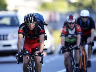 Bicycle Queensland wants a truce between cyclists and motorists. Picture: AAP Image/Josh Woning