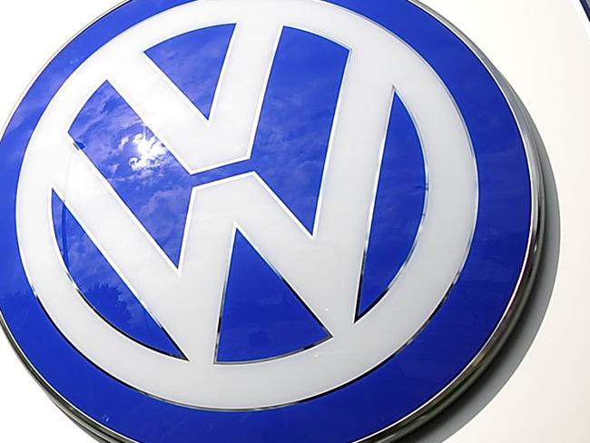 WOLFSBURG, GERMANY - SEPTEMBER 23: Rain clouds are seen over a Volkswagen symbol at the main entrance gate at Volkswagen production plant on September 23, 2015 in Wolfsburg, Germany. Volkswagen CEO Martin Winterkorn and other members of the supervisory board are believed to be meeting inside the headquarters to discuss the Volkswagen Diesel emission scandal, which affects 11 million vehicles worldwide. (Photo by Alexander Koerner/Getty Images)