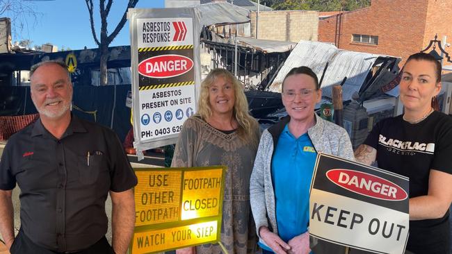 Gympie business owners are fed up with the lack of inaction of two burned down lots in the middle of Mary St which are obstructing key footpaths while posing an asbestos hazard. But the mess is soon to be cleared, council says.Â 