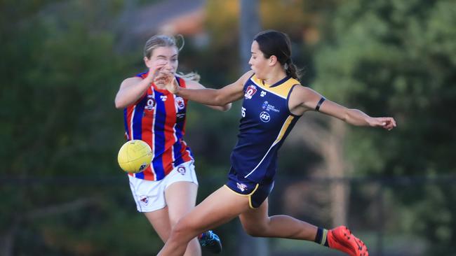 August 16, Gold Coast, Queensland - Lucy Single from Bond University in action against Wilston Grange in the Queensland AFLW played at Bond University on the Gold Coast. Scott Powick Newscorp