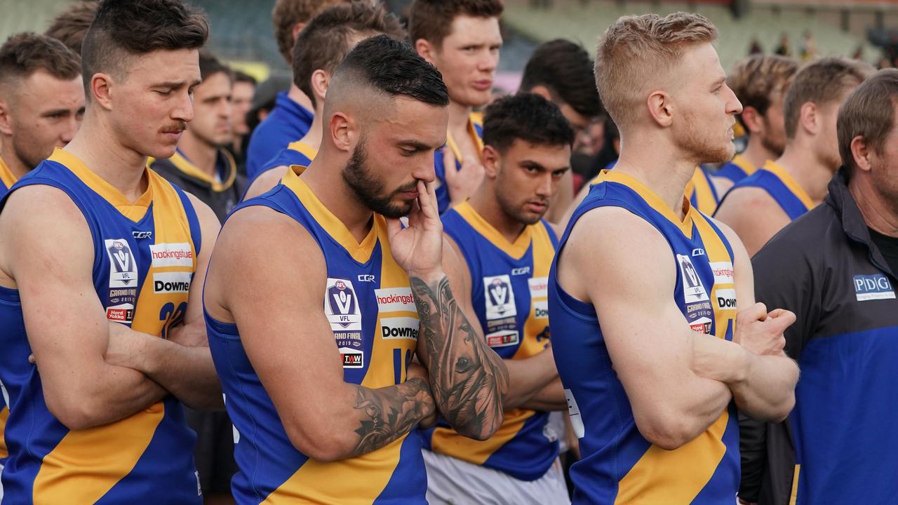 Williamstown looks dejected during the presentations after the VFL Grand Final match between the Williamstown Seagulls and the Richmond Tigers at Ikon Park in Melbourne, Sunday, September 22, 2019. (AAP Image/Scott Barbour) NO ARCHIVING, EDITORIAL USE ONLY