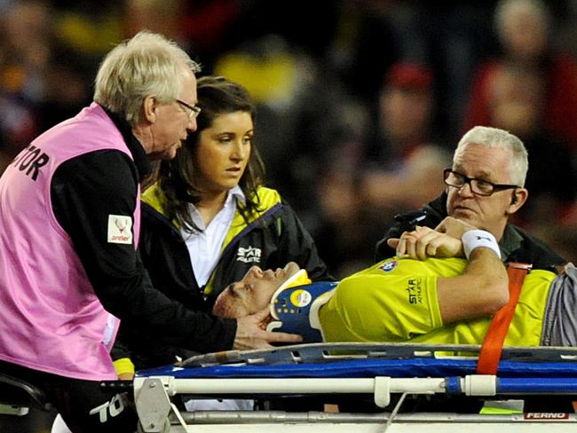 Troy Pannell is taken off the ground after he collided with a player in 2014.