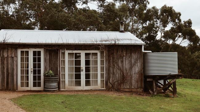 This rural acreage with rustic barn at Red Hill South, Victoria, is listed on A Perfect Space priced from $850 a day.