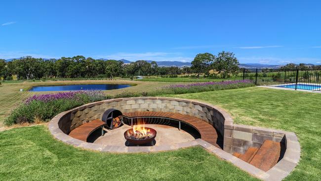 Warm up in the custom designed fire pit.