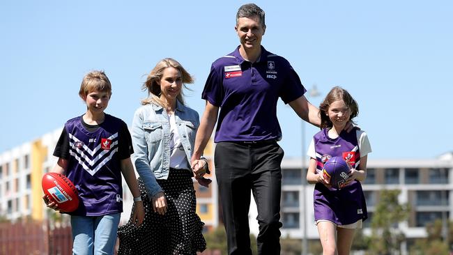 New Fremantle Dockers coach Justin Longmuir with his wife Melissa, son Zac and daughter Ava in Perth on Monday. Picture: AAP