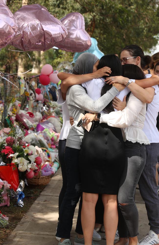 The family of three children killed by a drunk driver in Oatlands return to the crash scene. Picture: John Grainger