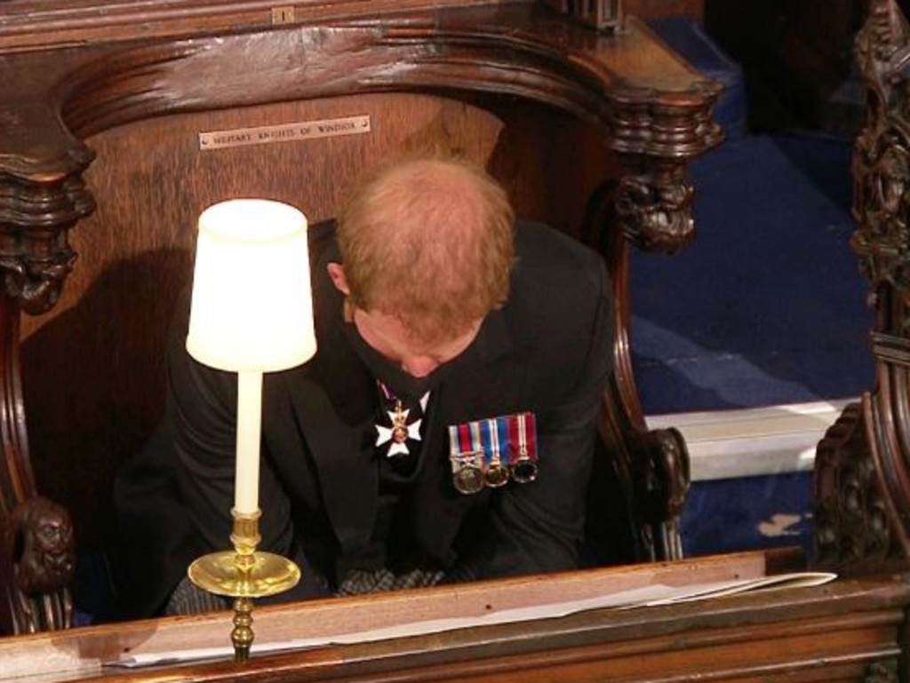 Prince Harry bows his head during Prince Philip's funeral. The Duke of Sussex sat along during the service. Picture: Supplied