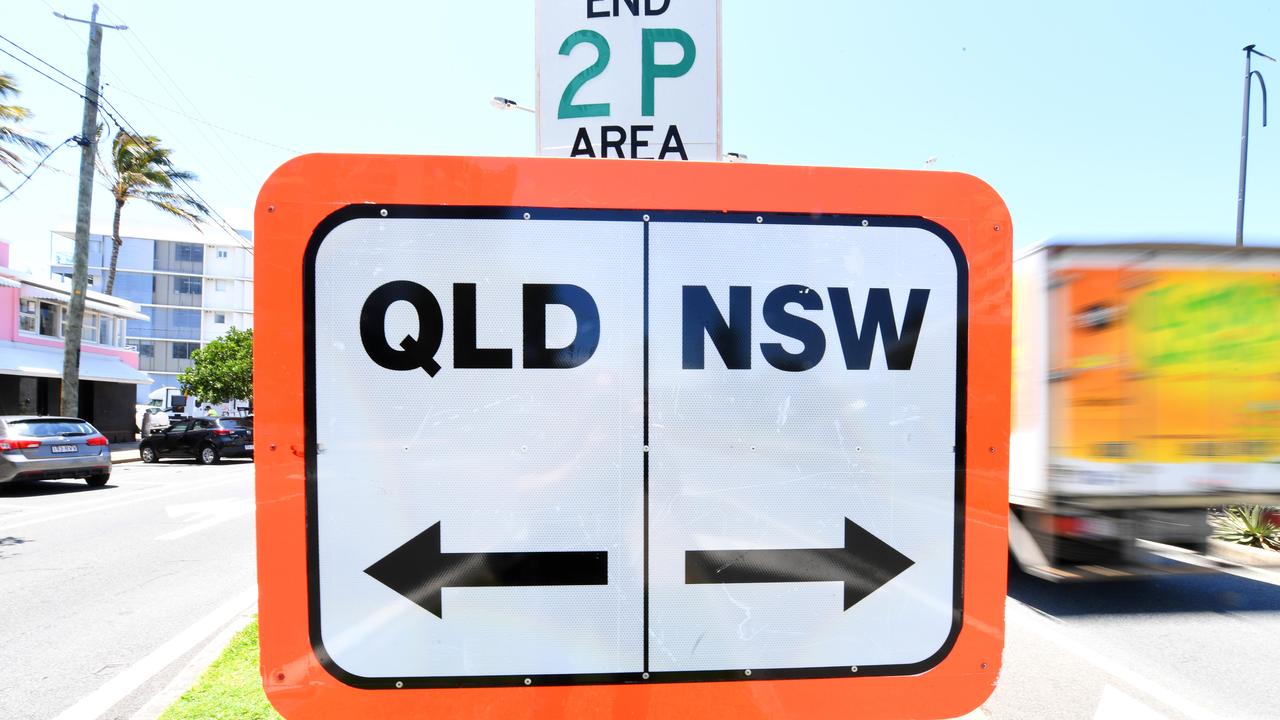 The first returning Queenslanders – and residents relocating from NSW and Victoria – began arriving in Brisbane via air on Monday after the border’s partial reopening at 5pm. Picture: NCA NewsWire / Dan Peled