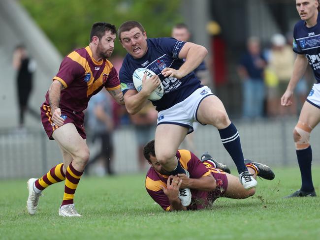 Newcastle’s Jayden Butterfield with the ball. Picture: Sue Graham