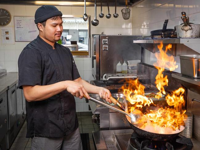 MELBOURNE, SEPTEMBER 9, 2024: Chef's rejoice after gas cooktops are back. Caption: Vivid Hawthorn executive chef Nobphadon Kaewkarn aka Chef Bird is pleased to learn gas cooktops are back on the menu after a state government backflipped on a decision to rollout induction and electric stovetops in all commercial kitchens. Picture: Mark Stewart