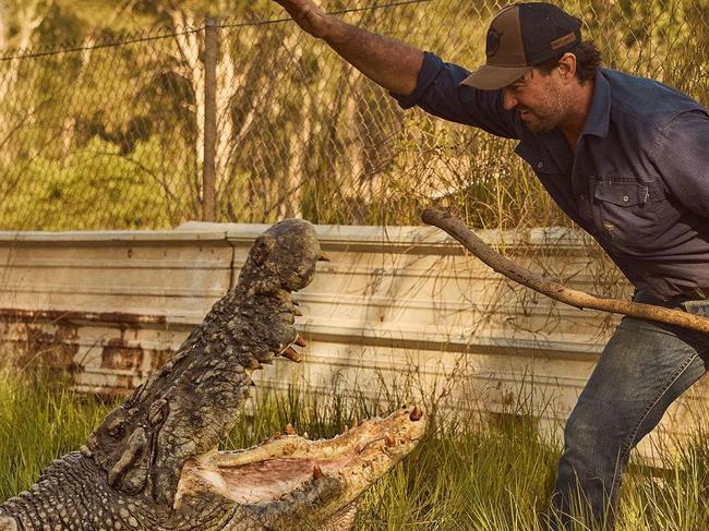 Crocodile wrangler Matt Wright is facing an arrest warrant over the helicopter crash which killed his friend and co-star Chris Wilson. Picture: Instagram