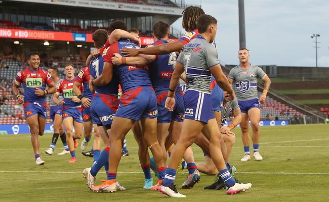 Knights players celebrate a try from Jirah Momoisea (Photo by Ashley Feder/Getty Images)