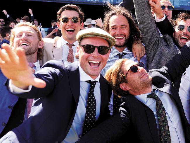 SYDNEY, AUSTRALIA - NOVEMBER 02: The crowd celebrate after watching the Melbourne Cup on the big screen during Sydney Racing at Royal Randwick Racecourse on November 02, 2021 in Sydney, Australia. (Photo by Mark Evans/Getty Images)