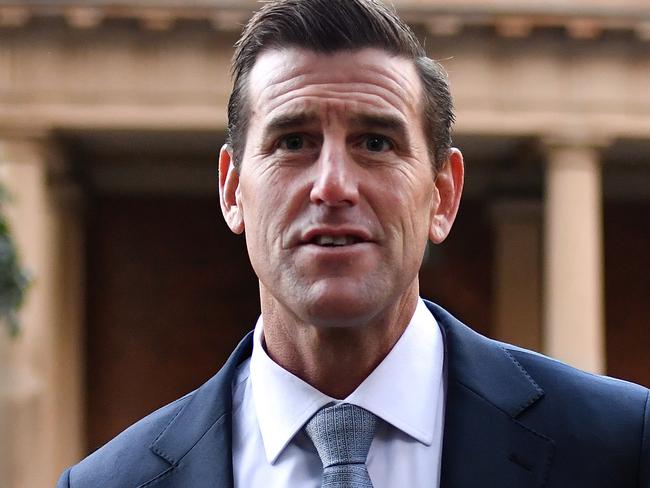 SYDNEY, AUSTRALIA - JUNE 07: Ben Roberts-Smith arrives at the Federal Court of Australia in Sydney on June 07, 2021 in Sydney, Australia. Ben Roberts-Smith is suing three Fairfax newspapers for defamation over reports he committed war crimes while serving in the Australian Special Air Services in Afghanistan. Ben Roberts-Smith is Australia's most decorated living soldier and a Victoria Cross recipient. (Photo by Sam Mooy/Getty Images)