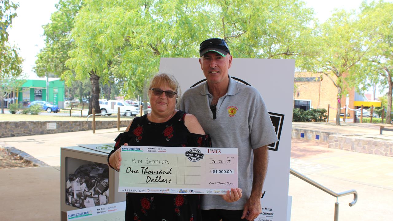 Award winner Kim Butcher with her husband Alan at the cheque presentation for Town Proud 2019.