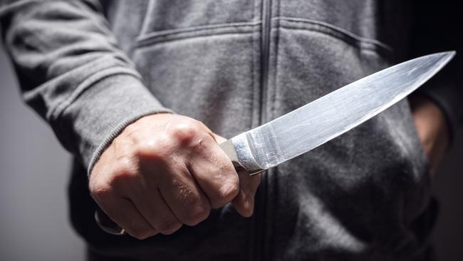 A woman had a knife held to her throat. Picture: Generic