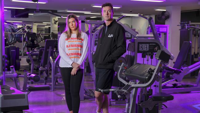 Simon Olive and his daughter Hannah, 19, who is a pilates instructor, said revenue for his gym with more than 1400 members has dropped to zero. Picture by Wayne Taylor