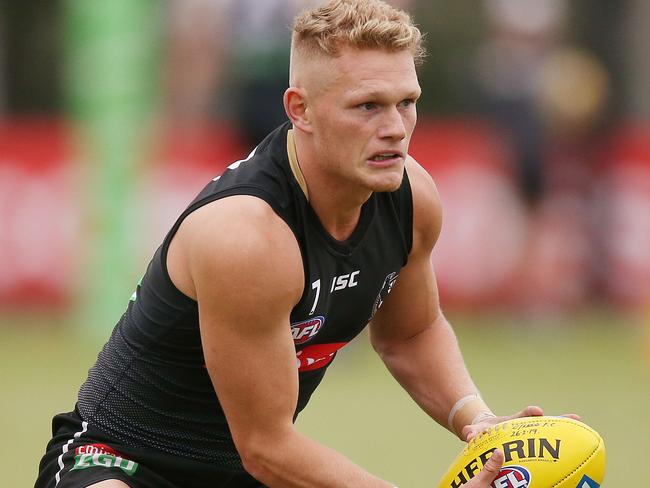 MELBOURNE, AUSTRALIA - MARCH 15: Adam Treloar of the Magpies looks upfield during the Collingwood Magpies Training Session on March 15, 2019 in Melbourne, Australia. (Photo by Michael Dodge/Getty Images)