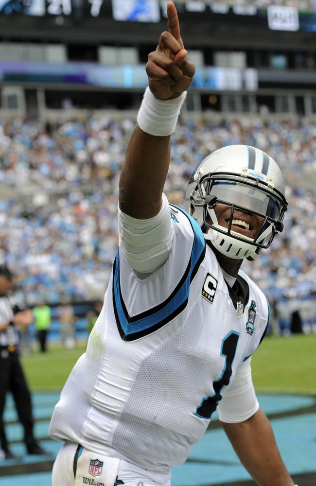 Carolina Panthers' Cam Newton (1) reacts after a teammate's touchdown.