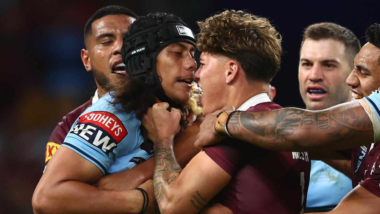 BRISBANE, AUSTRALIA - JUNE 21: Jarome Luai of the Blues and Reece Walsh of the Maroons scuffle during game two of the State of Origin series between the Queensland Maroons and the New South Wales Blues at Suncorp Stadium on June 21, 2023 in Brisbane, Australia. (Photo by Chris Hyde/Getty Images)