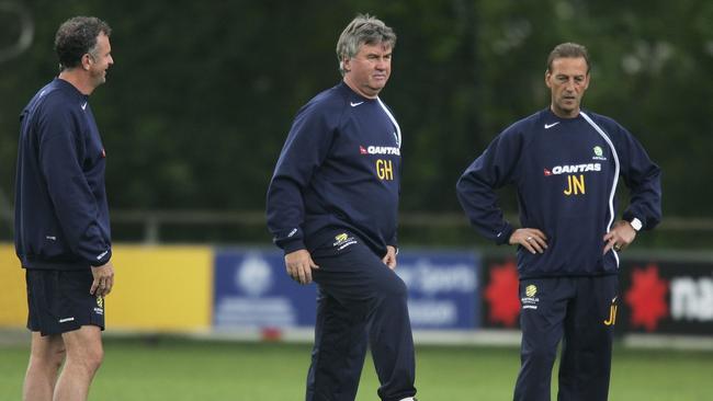 EINDHOVEN, NETHERLANDS - MAY 29: Australian coach Guus Hiddink looks on with his assistants Graham Arnold and Johan Neeskens during a training session as Australia prepare for the 2006 World Cup, held at the Mierlo training ground May 29, 2006 in Eindhoven, Netherlands. (Photo by Robert Cianflone/Getty Images)