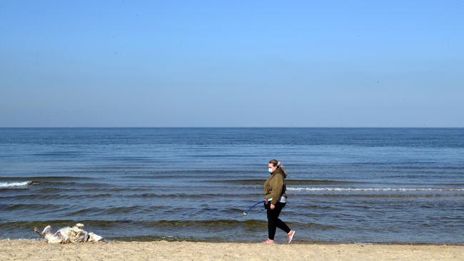 You can visit the beach, providing you live within 5km. Picture: David Crosling