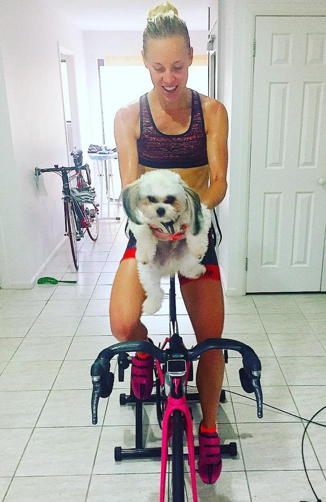 Maighan Brown training at home, with her dog. Picture: Instagram