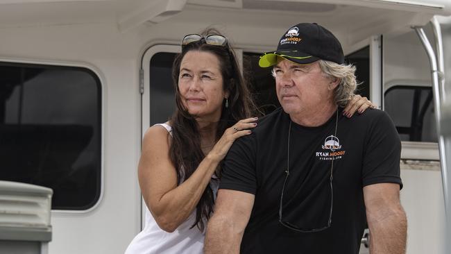 Increasing bull shark numbers are a concern to Ryan Moody fisherman and wife Karen a marine biologist, at their boat at Bluewater. Picture: Brian Cassey