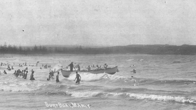 Members of the Sly family in Manly Council's surfboat at Manly. Picture Northern Beaches Library