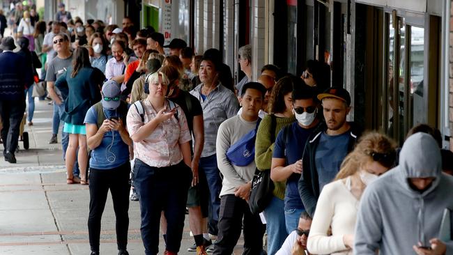 Lines of people outside Marrickville Centrelink to register for the Government assisted payments after losing jobs during to the pandemic. Picture: Toby Zerna