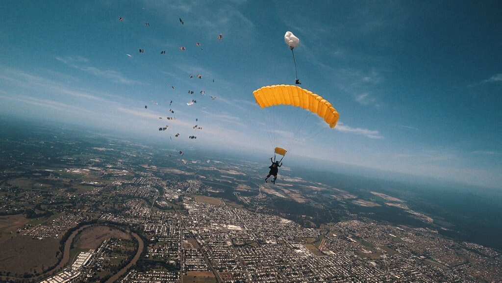 Brisbane radio host Stav Davidson dropped $10,000 in $5 notes during a skydive. Picture: Contributed