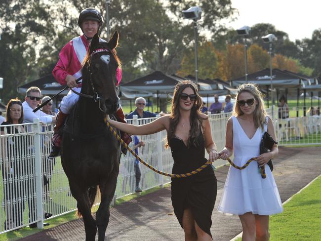 Arcadia Dream is led in by Emily Drexel, the grand daughter of owners Bob and Sandra Peters, and her friend Asha Stipanicev. Picture: Graeme Collopy