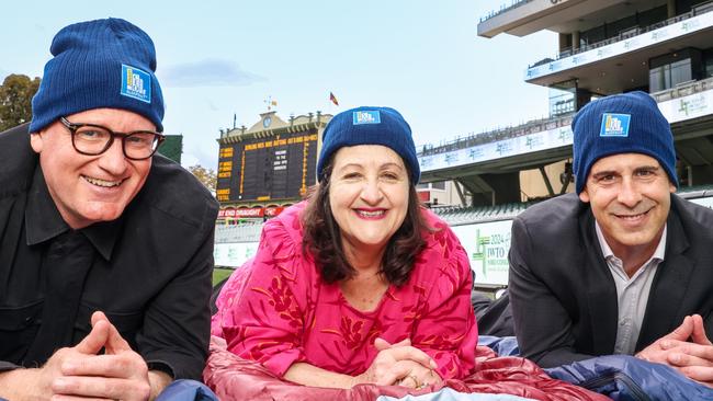 Illuminate Adelaide Foundation co-founder and creative director Lee Cumberlidge, left, with Vinnies SA chief executive Evelyn O’Loughlin and Adelaide Oval chief executive Nick Addison at Adelaide Oval. Picture: Russell Millard