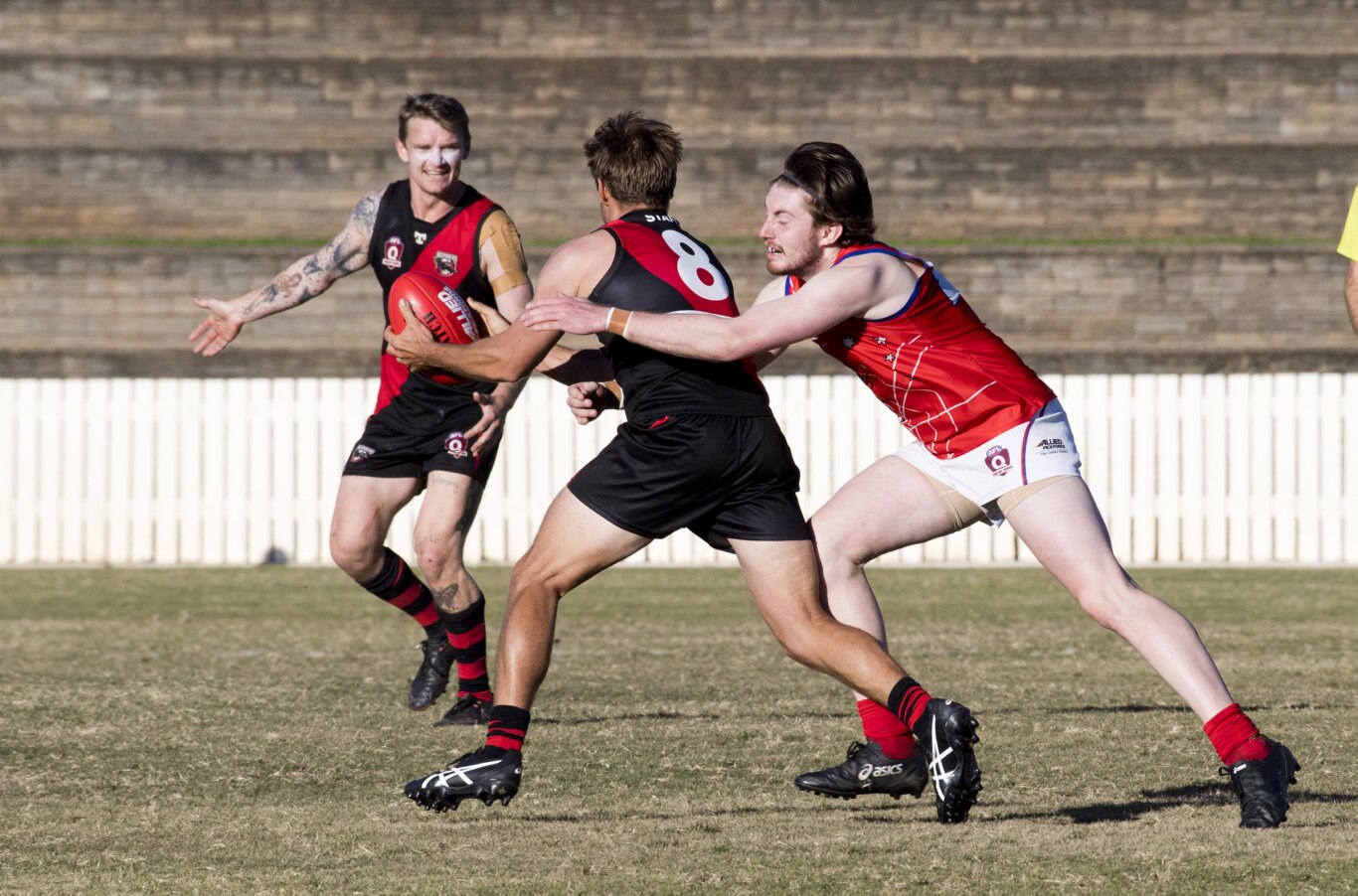 Ryan Gladman, Bombers and Shane Iles, Warwick. Picture: Nev Madsen