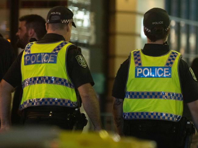 Police presence can be seen along Hindley Street on a Friday night in Adelaide, Kaurna Yarta on Friday, March 31, 2023. The Advertiser/ Morgan Sette