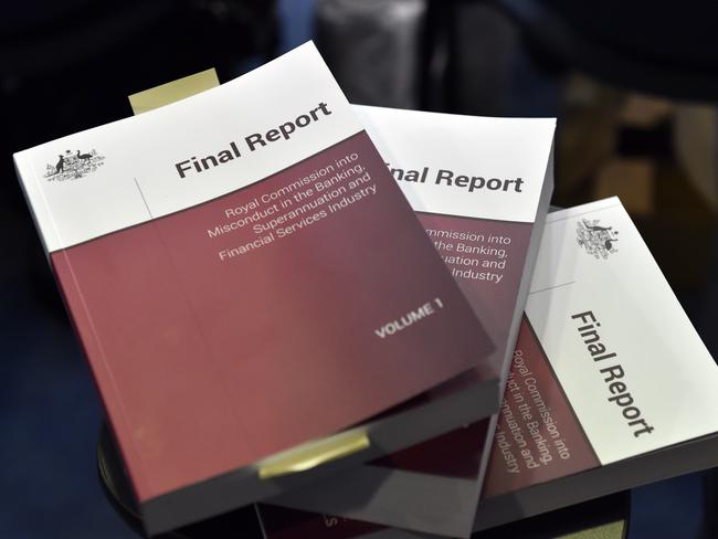 A copy of the report is seen at Treasurer Josh Frydenberg's press conference in response to the releasing of the Banking Royal Commission findings at Parliament House in Canberra, Monday, February 4, 2019. (AAP Image/Mick Tsikas) NO ARCHIVING