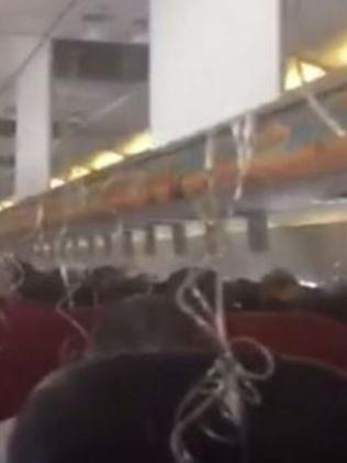 Oxygen masks dropped from above the seats. Picture: Nine News